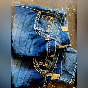 2 pairs of size 17 realco jeans.